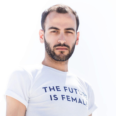 Author in a t-shirt that reads "The Future is Female"
