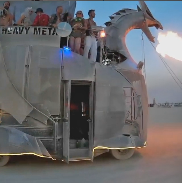 Heavy Meta - A metal fire breathing dragon that is a bus people can ride on top of.